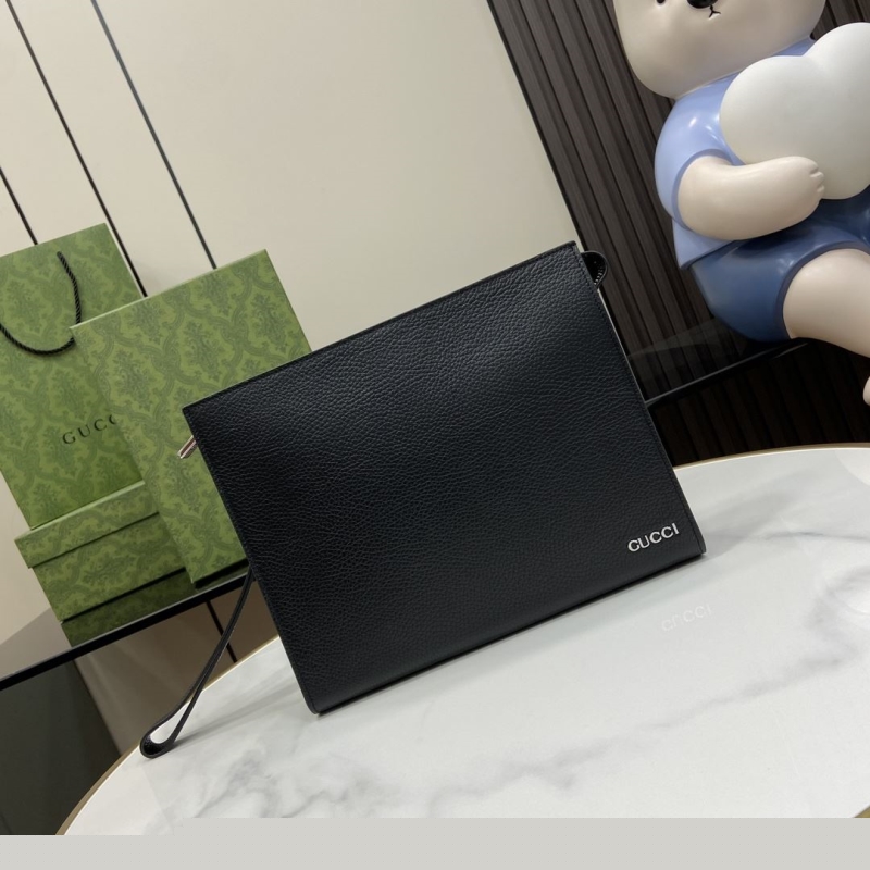 G*u*i clutch bags